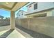 Covered patio overlooking a private, low-maintenance backyard with gravel at 4927 S Tune --, Mesa, AZ 85212