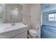 Bathroom featuring a clean, white vanity and a shower-tub combination at 4927 S Tune --, Mesa, AZ 85212