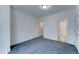 Spacious bedroom showcasing neutral tones and plush carpet at 4927 S Tune --, Mesa, AZ 85212