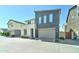 Charming two-story home with a two-car garage and low-maintenance landscaping at 4927 S Tune --, Mesa, AZ 85212