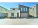 Charming two-story home with a two-car garage and low-maintenance landscaping at 4927 S Tune --, Mesa, AZ 85212