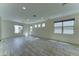 Bright living room with modern tile flooring and recessed lighting at 4927 S Tune --, Mesa, AZ 85212