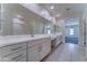 Modern ensuite bathroom featuring double sink vanity, shower and neutral color palette at 4927 S Tune --, Mesa, AZ 85212