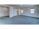 Main bedroom with carpet flooring, window shades, ensuite bathroom and walk-in closet at 4927 S Tune --, Mesa, AZ 85212
