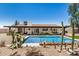 Beautiful backyard showcases refreshing pool, covered patio, and desert landscaping at 527 N Criss St, Chandler, AZ 85226
