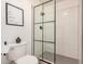 Shower room features a glass shower, subway tiles, and modern fixtures at 527 N Criss St, Chandler, AZ 85226