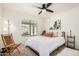 Bright bedroom featuring a ceiling fan, natural light and bohemian decor at 527 N Criss St, Chandler, AZ 85226