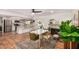 Open-concept dining area featuring tile floors, modern lighting, and direct access to the kitchen at 527 N Criss St, Chandler, AZ 85226