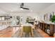 Stylish dining area with a modern table and chairs, seamlessly flowing into a bright kitchen at 527 N Criss St, Chandler, AZ 85226