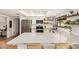 Bright and airy kitchen featuring a large island, stainless steel appliances, and modern finishes at 527 N Criss St, Chandler, AZ 85226