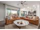Inviting living room with comfortable seating and a view to the outdoor patio at 6251 E Bramble Berry Ln, Cave Creek, AZ 85331