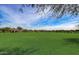 Expansive green space in a community park with a covered picnic area, perfect for outdoor activities and relaxation at 6251 E Bramble Berry Ln, Cave Creek, AZ 85331