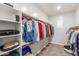 Organized walk-in closet with ample shelving and hanging space, providing practical storage solutions at 6251 E Bramble Berry Ln, Cave Creek, AZ 85331