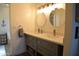 Bright bathroom boasts a double vanity with modern fixtures, offering a clean and functional space at 6352 W Campo Bello Dr, Glendale, AZ 85308