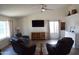 Airy living room with vaulted ceilings, wood floors, and stylish furnishings at 6352 W Campo Bello Dr, Glendale, AZ 85308