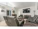 Inviting living room with comfortable seating, a mounted TV, and a mix of decor for a relaxed atmosphere at 7111 N 63Rd Dr, Glendale, AZ 85301