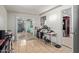 Spacious room featuring tile floors and a sliding glass door to the outside at 7111 N 63Rd Dr, Glendale, AZ 85301
