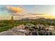 Luxury homes featuring tile roofs, circular driveways, lush landscaping, and golf course in a beautiful desert setting at 7475 E Gainey Ranch Rd # 22, Scottsdale, AZ 85258