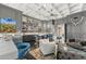 Modern bar featuring custom cabinets, striking lighting, and a comfortable lounge space at 7475 E Gainey Ranch Rd # 22, Scottsdale, AZ 85258