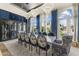 Bright dining area with seating for twelve and a temperature controlled wine storage at 7475 E Gainey Ranch Rd # 22, Scottsdale, AZ 85258