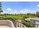 Scenic view of golf course and mountains from balcony at 7475 E Gainey Ranch Rd # 22, Scottsdale, AZ 85258