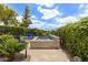 Serene backyard with a private hot tub, comfortable seating, and manicured landscaping at 7475 E Gainey Ranch Rd # 22, Scottsdale, AZ 85258