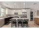 Stylish kitchen features a large island with seating and stainless steel appliances at 820 N 8Th Ave # 14, Phoenix, AZ 85007