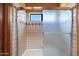 Bathroom with a glass shower door and neutral tile at 9030 E Trail Dr, Carefree, AZ 85377