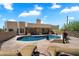 Spacious pool area with lounge chairs and ample space for outdoor entertaining at 9030 E Trail Dr, Carefree, AZ 85377
