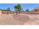 Generously sized, low-maintenance backyard with decorative planters adding character at 925 W San Marcos Dr, Chandler, AZ 85225