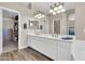 Bright bathroom with dual sinks, ample counter space, and a walk-in closet for optimal convenience at 925 W San Marcos Dr, Chandler, AZ 85225