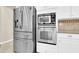 Kitchen featuring stainless steel appliances and white cabinetry at 925 W San Marcos Dr, Chandler, AZ 85225