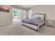 This large main bedroom features neutral carpet, plantation shutters and access to the patio at 925 W San Marcos Dr, Chandler, AZ 85225