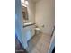 Modern bathroom with granite counters, white cabinets, and tile floors at 10101 N 91St Ave # 88, Peoria, AZ 85345