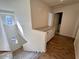 Upstairs hallway features built-in cabinets and hardwood floors at 10101 N 91St Ave # 88, Peoria, AZ 85345