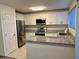 Stylish kitchen featuring stainless steel appliances and sleek granite countertops at 10101 N 91St Ave # 88, Peoria, AZ 85345