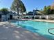 Community pool with ample seating, shade and pristine water at 10101 N 91St Ave # 88, Peoria, AZ 85345