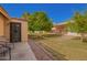 Backyard view of the lawn and patio at 1021 S Greenfield Rd # 1165, Mesa, AZ 85206