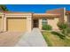 Charming single-story home with attached garage, manicured lawn, and inviting curb appeal at 1021 S Greenfield Rd # 1165, Mesa, AZ 85206