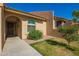 Charming home featuring an arched entryway and complemented by a well-maintained yard at 1021 S Greenfield Rd # 1165, Mesa, AZ 85206