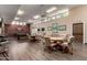 Spacious game room with card tables, billiard table, and comfortable seating at 1021 S Greenfield Rd # 1165, Mesa, AZ 85206