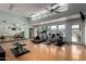 Well-equipped gym with treadmills, elliptical, weights, and mirrored wall at 1021 S Greenfield Rd # 1165, Mesa, AZ 85206