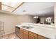 A kitchen counter and sink area in a home interior at 1021 S Greenfield Rd # 1165, Mesa, AZ 85206