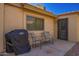 Cozy outdoor patio with chairs and grill, perfect for relaxing or entertaining at 1021 S Greenfield Rd # 1165, Mesa, AZ 85206