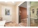 Bright sunroom with tile flooring, a glass door to the outside, and sliding glass doors to the interior at 1021 S Greenfield Rd # 1165, Mesa, AZ 85206