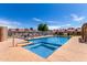 Outdoor pool and spa area perfect for relaxing and enjoying community amenities at 1021 S Greenfield Rd # 1165, Mesa, AZ 85206