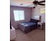 Well-lit bedroom with window, offering a comfortable and practical living space at 10335 W Pima St, Tolleson, AZ 85353