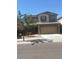 Two-story home with neutral paint, two-car garage, and low-maintenance landscaping at 10335 W Pima St, Tolleson, AZ 85353