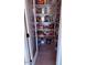 Walk-in pantry with built-in shelving and storage at 10335 W Pima St, Tolleson, AZ 85353