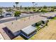 Desirable home featuring a screened-in porch and well-maintained yard in a quiet neighborhood at 11135 W Cameo Dr, Sun City, AZ 85351
